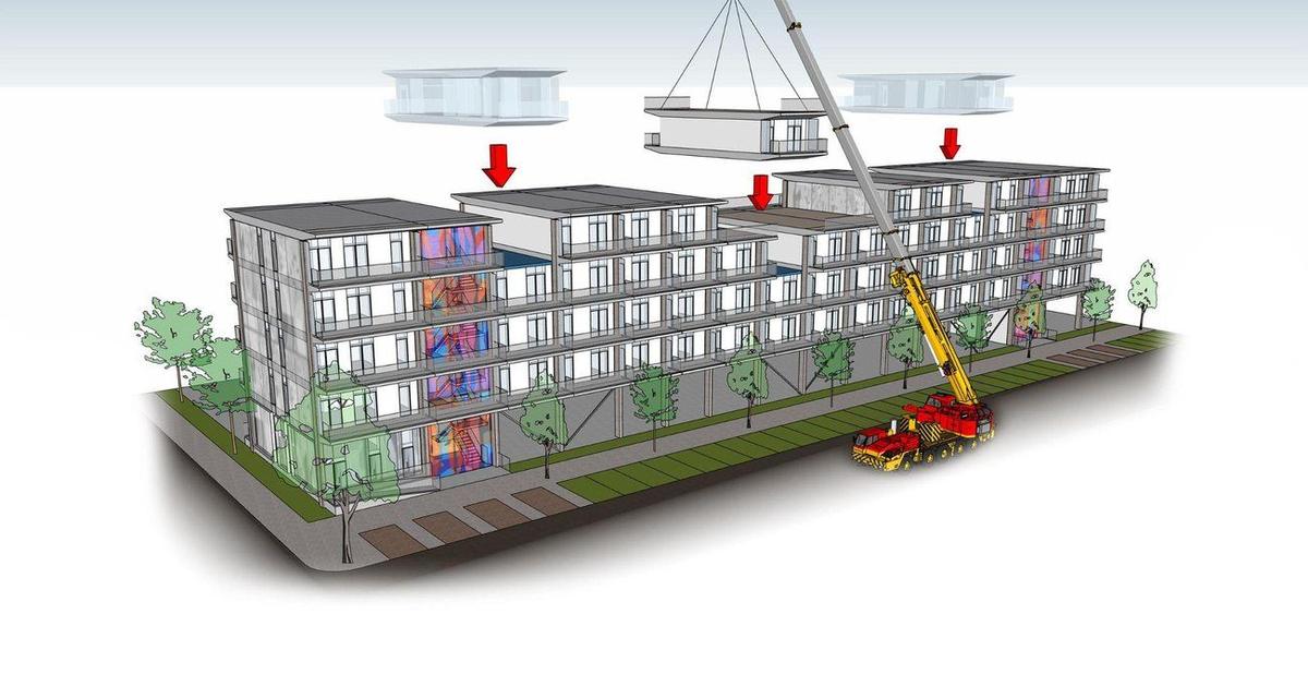 Factory-built homes craned onto the frame